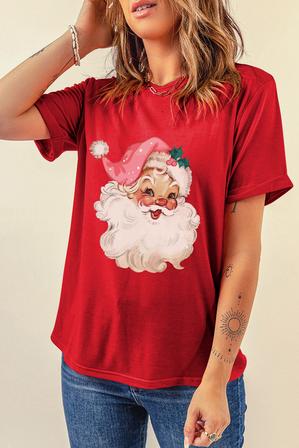 Get into the holiday spirit with this fun and festive Women's Red Christmas Santa Claus Print Crew Neck T-Shirt. The classic crew neck design and short sleeves make it comfortable and stylish for a casual and cozy look during the festive season. The captivating red color and whimsical Santa Claus print add a touch of magic to your holiday outfit. Perfect for spreading cheer and making memories with friends and family. This cheerful graphic tee is a must-have for your holiday wardrobe, featuring 62% polyester, 32% cotton, and 6% elastane for a comfortable fit. - Detail View 4 Get into the holiday spirit with this fun and festive Women's Red Christmas Santa Claus Print Crew Neck T-Shirt. The classic crew neck design and short sleeves make it comfortable and stylish for a casual and cozy look during the festive season. The captivating red color and whimsical Santa Claus print add a touch of magic to your holiday outfit. Perfect for spreading cheer and making memories with friends and family. This cheerful graphic tee is a must-have for your holiday wardrobe, featuring 62% polyester, 32% cotton, and 6% elastane for a comfortable fit. - Detail View 4