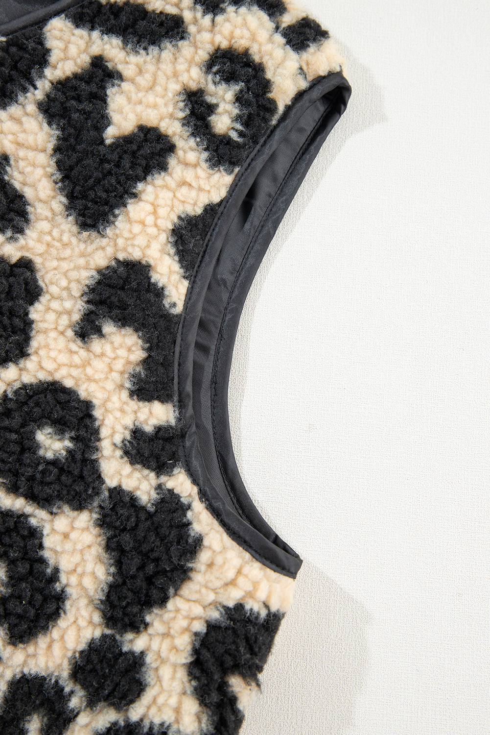 Trendy Sleeveless Vest: Black Leopard Print, Plush Sherpa Material - Detail View 22 Trendy Sleeveless Vest: Black Leopard Print, Plush Sherpa Material - Detail View 22