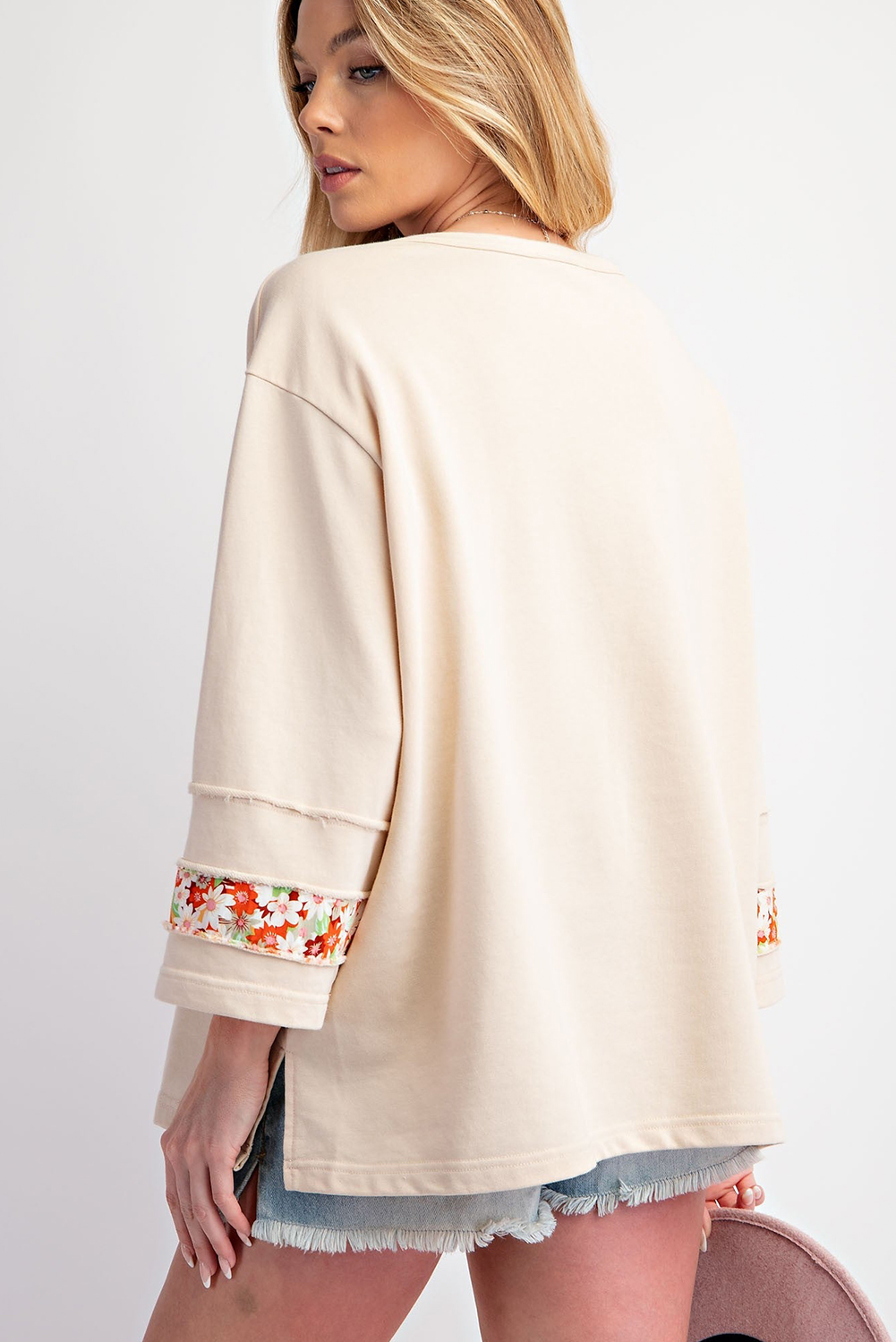 Casual Graphic Top with Exposed Seam and Flower Design - Beige - Detail View 2 Casual Graphic Top with Exposed Seam and Flower Design - Beige - Detail View 2