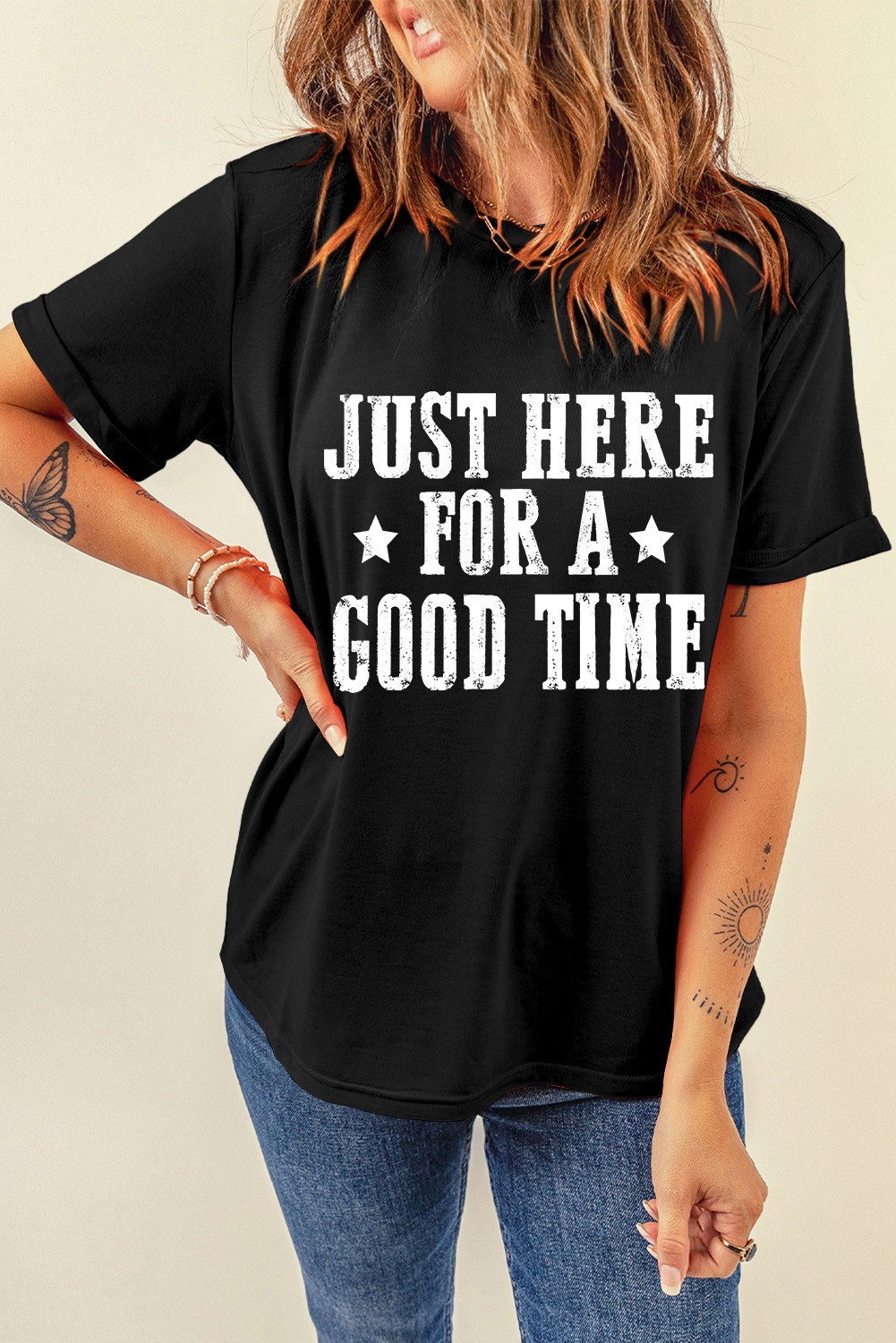 Add a touch of fun and personality to your casual wardrobe with this Women's Black 'Just Here For A Good Time' Graphic Round Neck T-Shirt. The casual staple features an upbeat message on the front, adding a playful and humorous element to your outfit. The round neck and short sleeves provide a comfortable and relaxed fit, making it perfect for a day out or casual gatherings. Made from a blend of 62% polyester, 32% cotton, and 6% elastane, this t-shirt ensures both comfort and durability. The solid black color and versatile style make it easy to pair with jeans or shorts for a simple and effortless look. Embrace the laid-back vibes with this graphic tee, ideal for a relaxed day out or a casual summer gathering. - Detail View 9 Add a touch of fun and personality to your casual wardrobe with this Women's Black 'Just Here For A Good Time' Graphic Round Neck T-Shirt. The casual staple features an upbeat message on the front, adding a playful and humorous element to your outfit. The round neck and short sleeves provide a comfortable and relaxed fit, making it perfect for a day out or casual gatherings. Made from a blend of 62% polyester, 32% cotton, and 6% elastane, this t-shirt ensures both comfort and durability. The solid black color and versatile style make it easy to pair with jeans or shorts for a simple and effortless look. Embrace the laid-back vibes with this graphic tee, ideal for a relaxed day out or a casual summer gathering. - Detail View 9