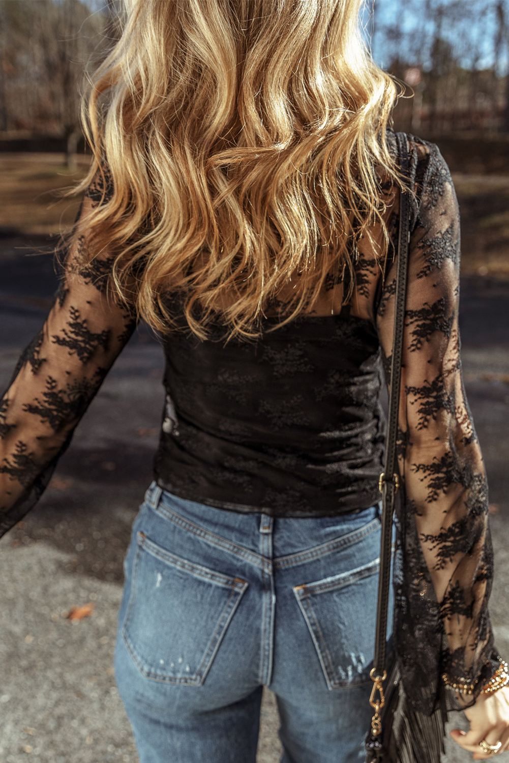 Elegant Sheer Black Blouse: Lace Crochet Detailing, Slim Fit, Long Sleeve - Detail View 2 Elegant Sheer Black Blouse: Lace Crochet Detailing, Slim Fit, Long Sleeve - Detail View 2