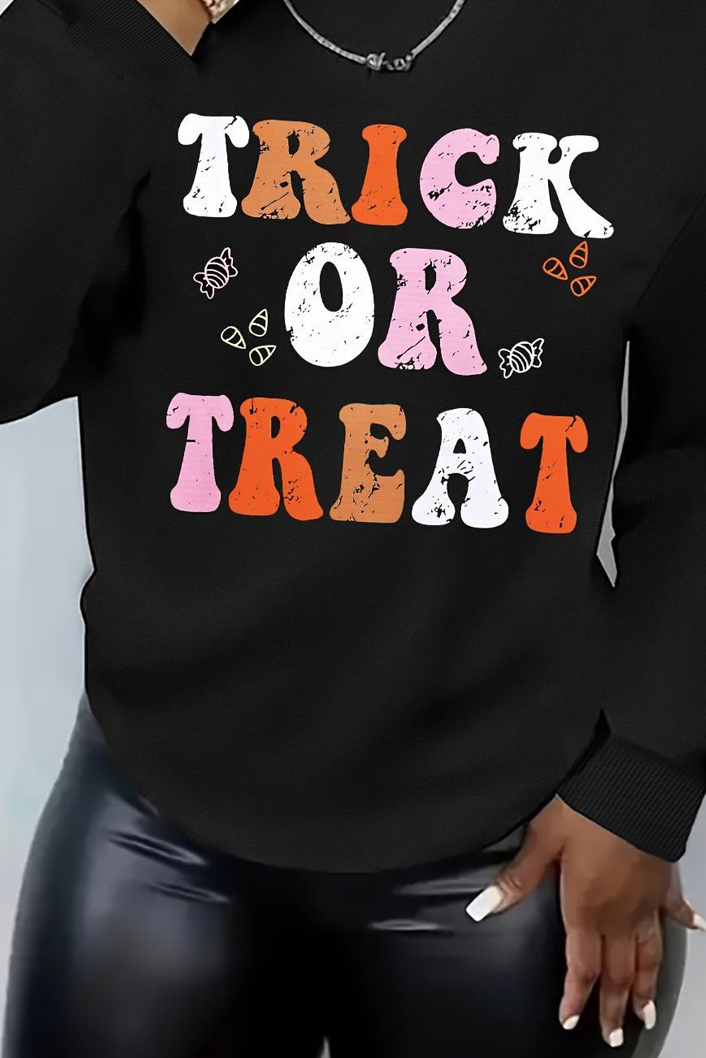 Women's Black TRICK OR TREAT Graphic Crewneck Halloween Sweatshirt - Detail View 6 Women's Black TRICK OR TREAT Graphic Crewneck Halloween Sweatshirt - Detail View 6