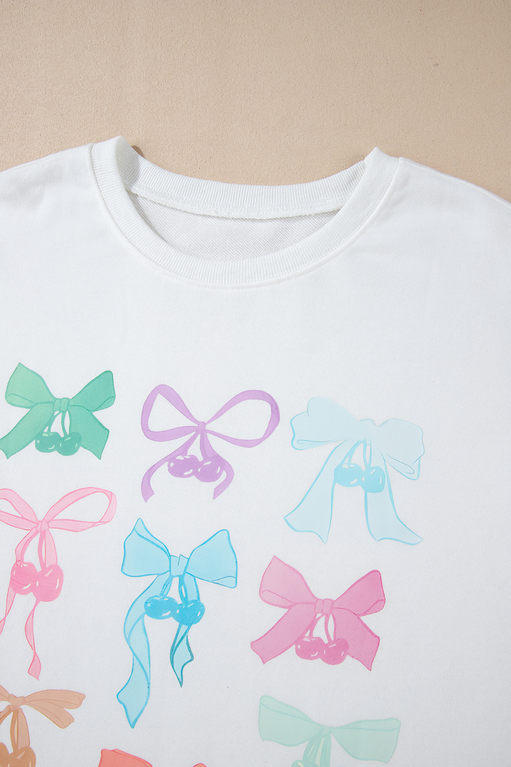 Charming White Sweatshirt with Bow Detail and Relaxed Drop Shoulder Design - Detail View 6 Charming White Sweatshirt with Bow Detail and Relaxed Drop Shoulder Design - Detail View 6