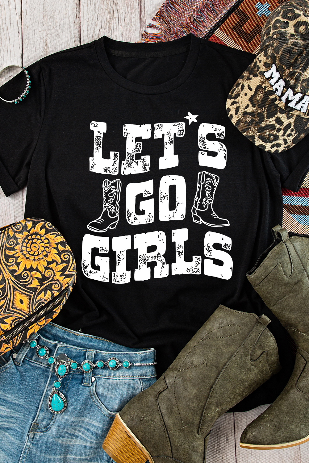 Make a bold statement with this Women's 'LETs Go Girls' Black Crew Neck Graphic T-Shirt. Perfect for fans who love to show off their team spirit, this graphic tee features a relaxed fit and a comfortable crew neck design. The graphic 'LETs Go Girls' print is a fun and playful way to express your enthusiasm for your favorite team. Pair it with your favorite jeans, athletic wear, or leggings for a complete outfit that's both stylish and comfortable. With its durable construction and long-lasting design, this graphic T-shirt is a great addition to any wardrobe. - Detail View 4 Make a bold statement with this Women's 'LETs Go Girls' Black Crew Neck Graphic T-Shirt. Perfect for fans who love to show off their team spirit, this graphic tee features a relaxed fit and a comfortable crew neck design. The graphic 'LETs Go Girls' print is a fun and playful way to express your enthusiasm for your favorite team. Pair it with your favorite jeans, athletic wear, or leggings for a complete outfit that's both stylish and comfortable. With its durable construction and long-lasting design, this graphic T-shirt is a great addition to any wardrobe. - Detail View 4