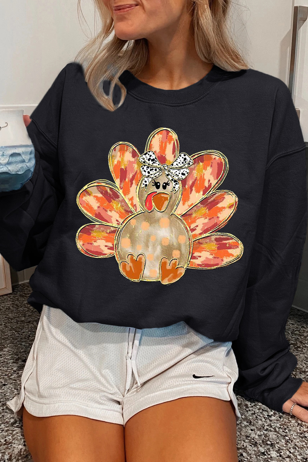 Cozy Casual Black Sweatshirt with Thanksgiving Turkey Graphic and Bow - Detail View 2 Cozy Casual Black Sweatshirt with Thanksgiving Turkey Graphic and Bow - Detail View 2