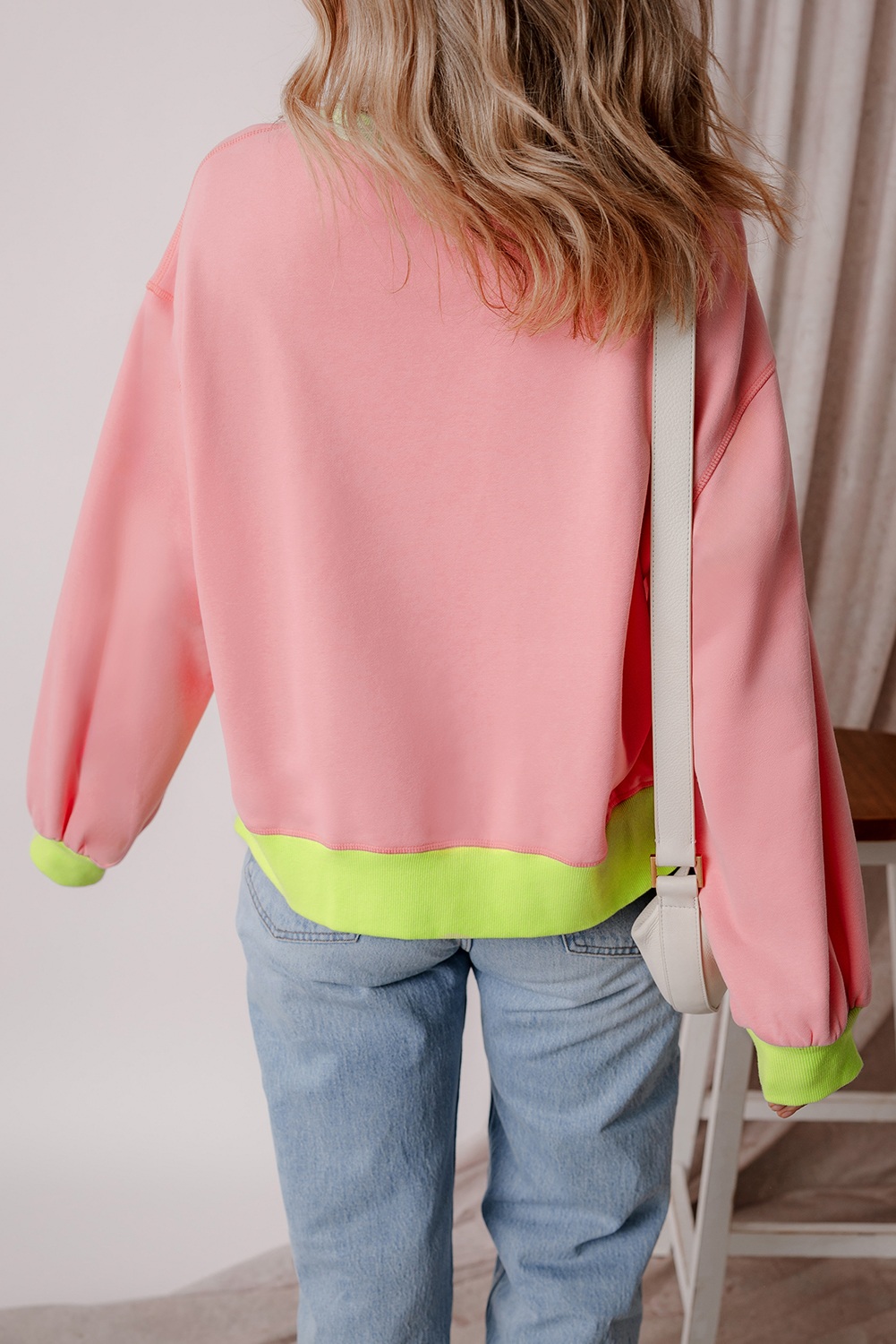Stylish and Comfortable Sweatshirt - Pink Teacher Logo with Lightning Checkered Print - Detail View 2 Stylish and Comfortable Sweatshirt - Pink Teacher Logo with Lightning Checkered Print - Detail View 2