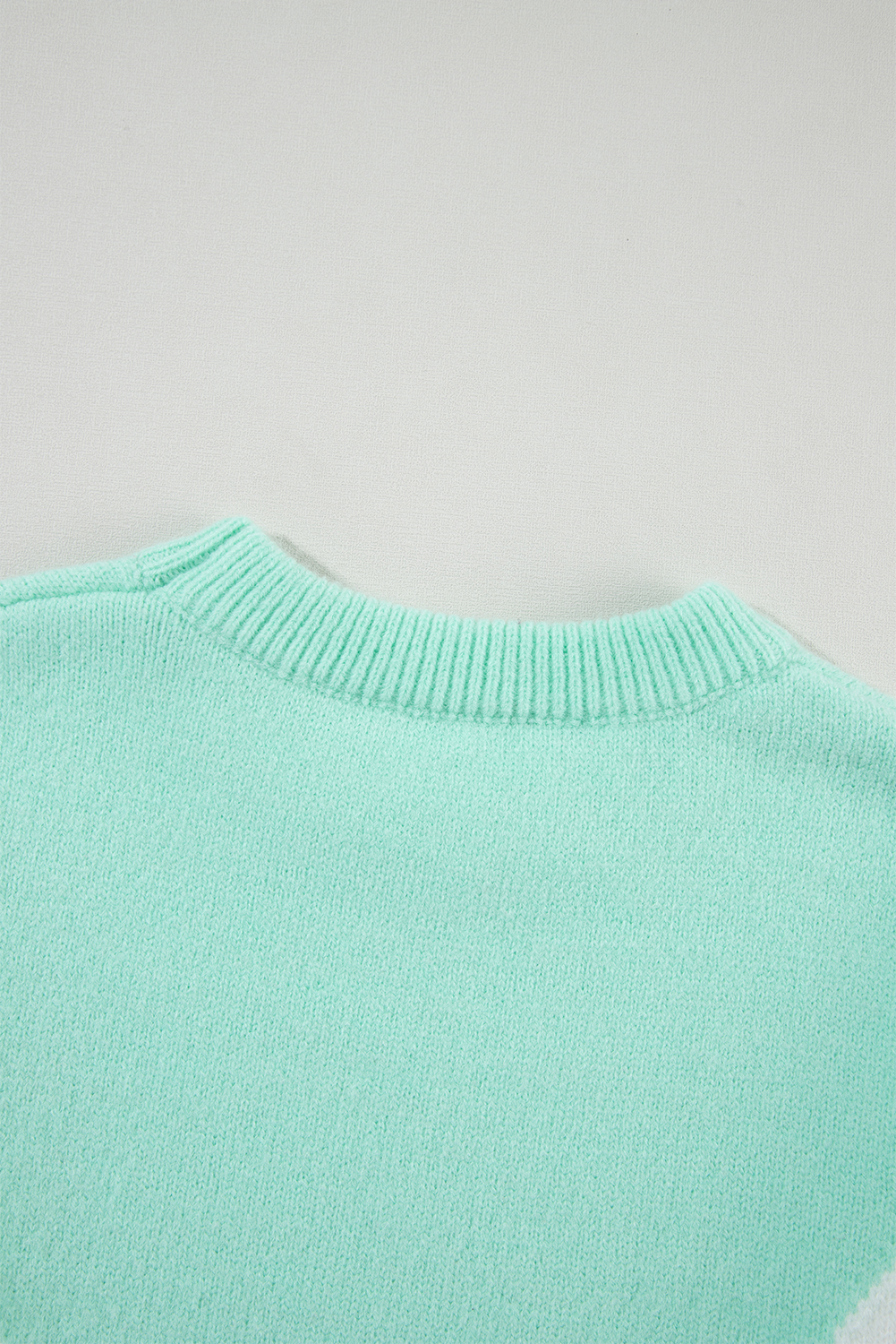 Elevate your winter wardrobe with this Women's Green Chevron Colorblock Ribbed Knit Drop Shoulder Sweater. The eye-catching chevron pattern adds a dynamic and stylish look to your outfit, while the ribbed knit texture offers a cozy and comfortable feel. The drop shoulder silhouette creates a relaxed and on-trend vibe, making it a versatile addition to your wardrobe. Made from a blend of 42% acrylic, 30% polyester, and 28% polyamide, this sweater ensures both warmth and durability. The colorblock design adds a modern twist to your ensemble, making it a fashionable choice for daily wear. Pair it with your favorite jeans and boots for a chic and cozy winter look. Update your style with this versatile and stylish sweater. - Detail View 9 Elevate your winter wardrobe with this Women's Green Chevron Colorblock Ribbed Knit Drop Shoulder Sweater. The eye-catching chevron pattern adds a dynamic and stylish look to your outfit, while the ribbed knit texture offers a cozy and comfortable feel. The drop shoulder silhouette creates a relaxed and on-trend vibe, making it a versatile addition to your wardrobe. Made from a blend of 42% acrylic, 30% polyester, and 28% polyamide, this sweater ensures both warmth and durability. The colorblock design adds a modern twist to your ensemble, making it a fashionable choice for daily wear. Pair it with your favorite jeans and boots for a chic and cozy winter look. Update your style with this versatile and stylish sweater. - Detail View 9