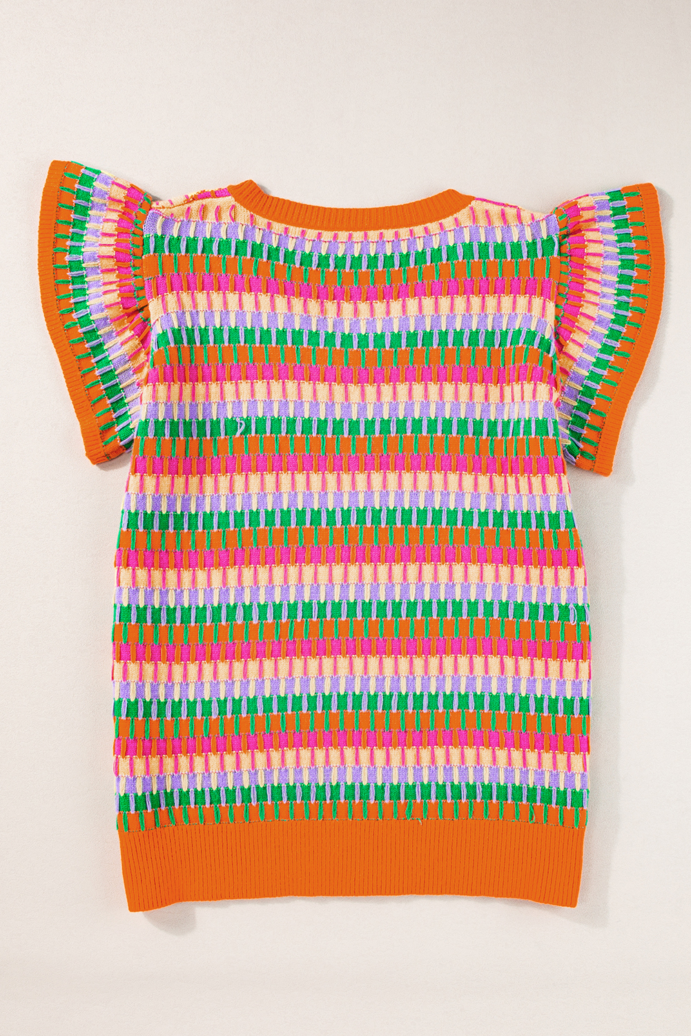 Add a touch of elegance and sophistication to your wardrobe with this Women's Elegant Multicolor Flutter Sleeve Knitted Sweater Top. The vibrant multicolor silhouette is sure to turn heads, while the flutter sleeves bring a delicate and feminine touch. The V-neck design shows off your collarbones and creates a flattering, seductive look. The breathable summer knitted fabric ensures comfort and ease of movement, making it perfect for daily wear, vacation, or date nights. The sheath silhouette flatters different body shapes, and the cap sleeves provide a relaxed, casual fit. Whether you're dressing up or dressing down, this sweater top is a must-have addition to your summer wardrobe. Made from a blend of soft, technical fabrics, this top features a ruffle detail that adds a playful, whimsical touch. With its easy, effortless style, you'll find yourself reaching for it again and again. - Detail View 4 Add a touch of elegance and sophistication to your wardrobe with this Women's Elegant Multicolor Flutter Sleeve Knitted Sweater Top. The vibrant multicolor silhouette is sure to turn heads, while the flutter sleeves bring a delicate and feminine touch. The V-neck design shows off your collarbones and creates a flattering, seductive look. The breathable summer knitted fabric ensures comfort and ease of movement, making it perfect for daily wear, vacation, or date nights. The sheath silhouette flatters different body shapes, and the cap sleeves provide a relaxed, casual fit. Whether you're dressing up or dressing down, this sweater top is a must-have addition to your summer wardrobe. Made from a blend of soft, technical fabrics, this top features a ruffle detail that adds a playful, whimsical touch. With its easy, effortless style, you'll find yourself reaching for it again and again. - Detail View 4