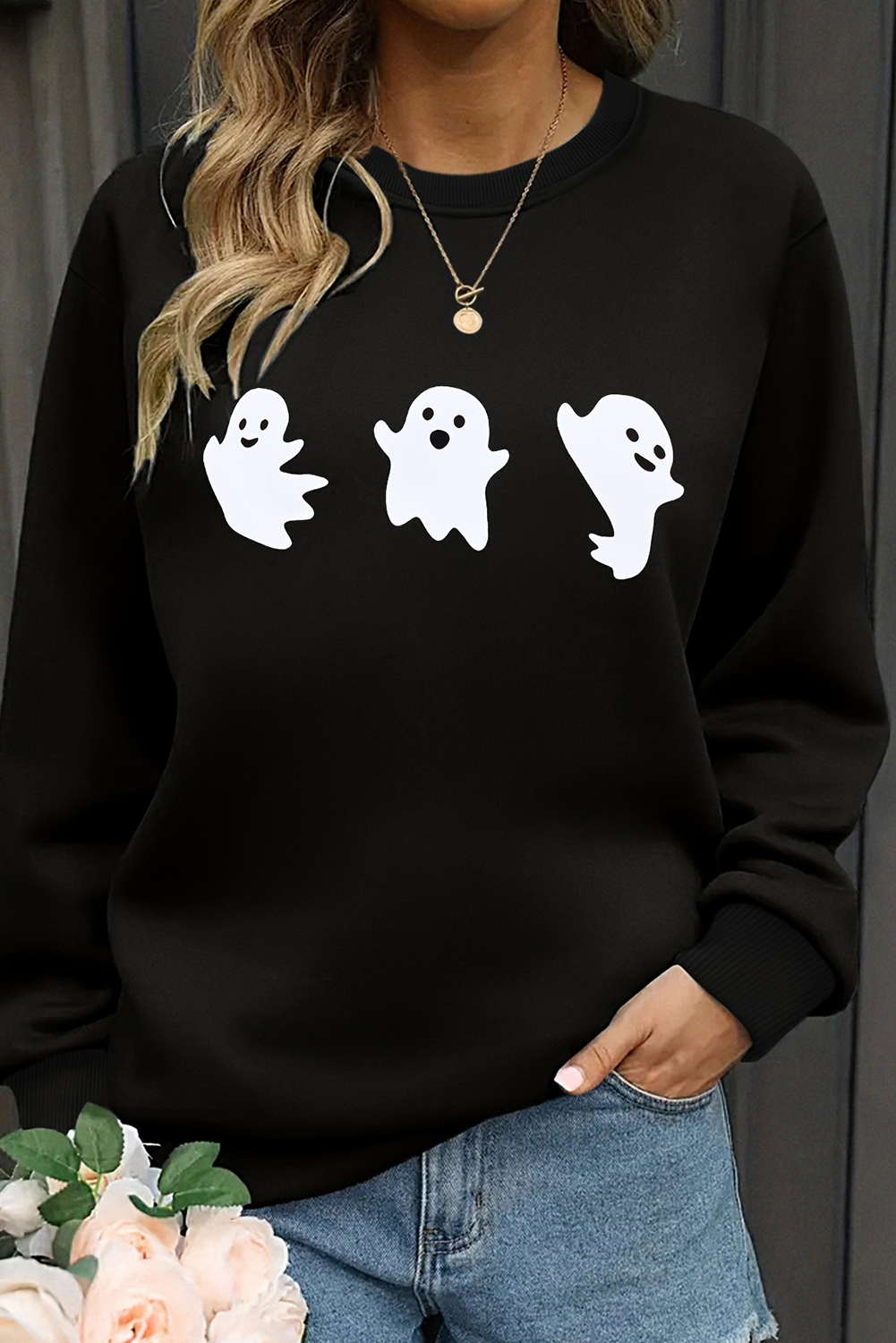 Embrace the festive spirit of Halloween with this Women's Black Halloween Ghosts Print Round Neck Sweatshirt. Stand out with the playful ghost design that captures the essence of Halloween, adding a touch of fun to your wardrobe. The classic crew neck and long sleeves make it a cozy and comfortable choice for casual outings during the fall and autumn seasons. Made from a premium blend of 50% polyester and 50% cotton, this sweatshirt ensures durability and breathability. The black color adds a chic and versatile touch, allowing you to easily pair it with your favorite bottoms. Enjoy the versatility of the long sleeves, ideal for layering on cooler days or wearing on its own during warmer weather. This graphic sweatshirt is the perfect combination of chic and casual, adding a trendy and festive vibe to your daily outfits. - Detail View 9 Embrace the festive spirit of Halloween with this Women's Black Halloween Ghosts Print Round Neck Sweatshirt. Stand out with the playful ghost design that captures the essence of Halloween, adding a touch of fun to your wardrobe. The classic crew neck and long sleeves make it a cozy and comfortable choice for casual outings during the fall and autumn seasons. Made from a premium blend of 50% polyester and 50% cotton, this sweatshirt ensures durability and breathability. The black color adds a chic and versatile touch, allowing you to easily pair it with your favorite bottoms. Enjoy the versatility of the long sleeves, ideal for layering on cooler days or wearing on its own during warmer weather. This graphic sweatshirt is the perfect combination of chic and casual, adding a trendy and festive vibe to your daily outfits. - Detail View 9