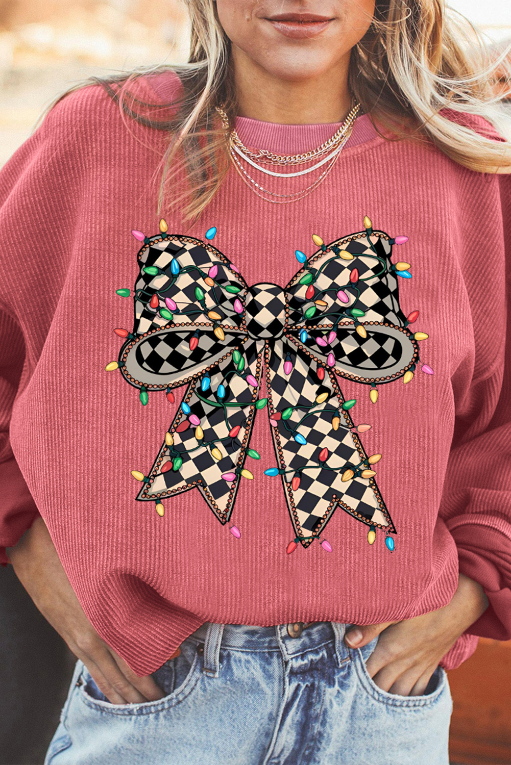 Trendy Women's Graphic Sweatshirt with Bow Pattern and Checkered Details - Detail View 2 Trendy Women's Graphic Sweatshirt with Bow Pattern and Checkered Details - Detail View 2