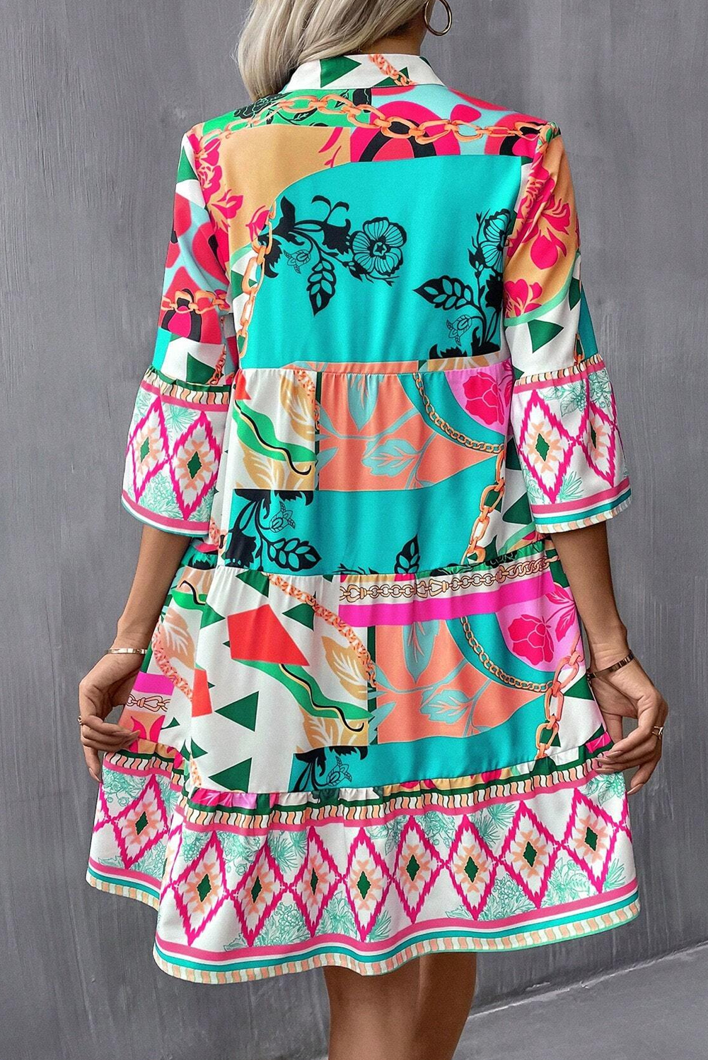 Trendy Abstract Printed Mini Dress: Multicoloured Design with Elegant Notched Neck & Flattering Half Sleeves - Detail View 2 Trendy Abstract Printed Mini Dress: Multicoloured Design with Elegant Notched Neck & Flattering Half Sleeves - Detail View 2