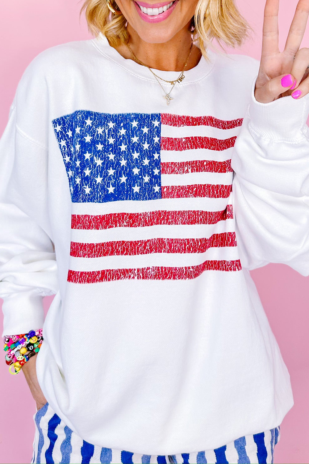 Casual and Comfortable Women's Winter Essential - White Drop Shoulder Sweatshirt with Flag Graphic - Detail View 3 Casual and Comfortable Women's Winter Essential - White Drop Shoulder Sweatshirt with Flag Graphic - Detail View 3