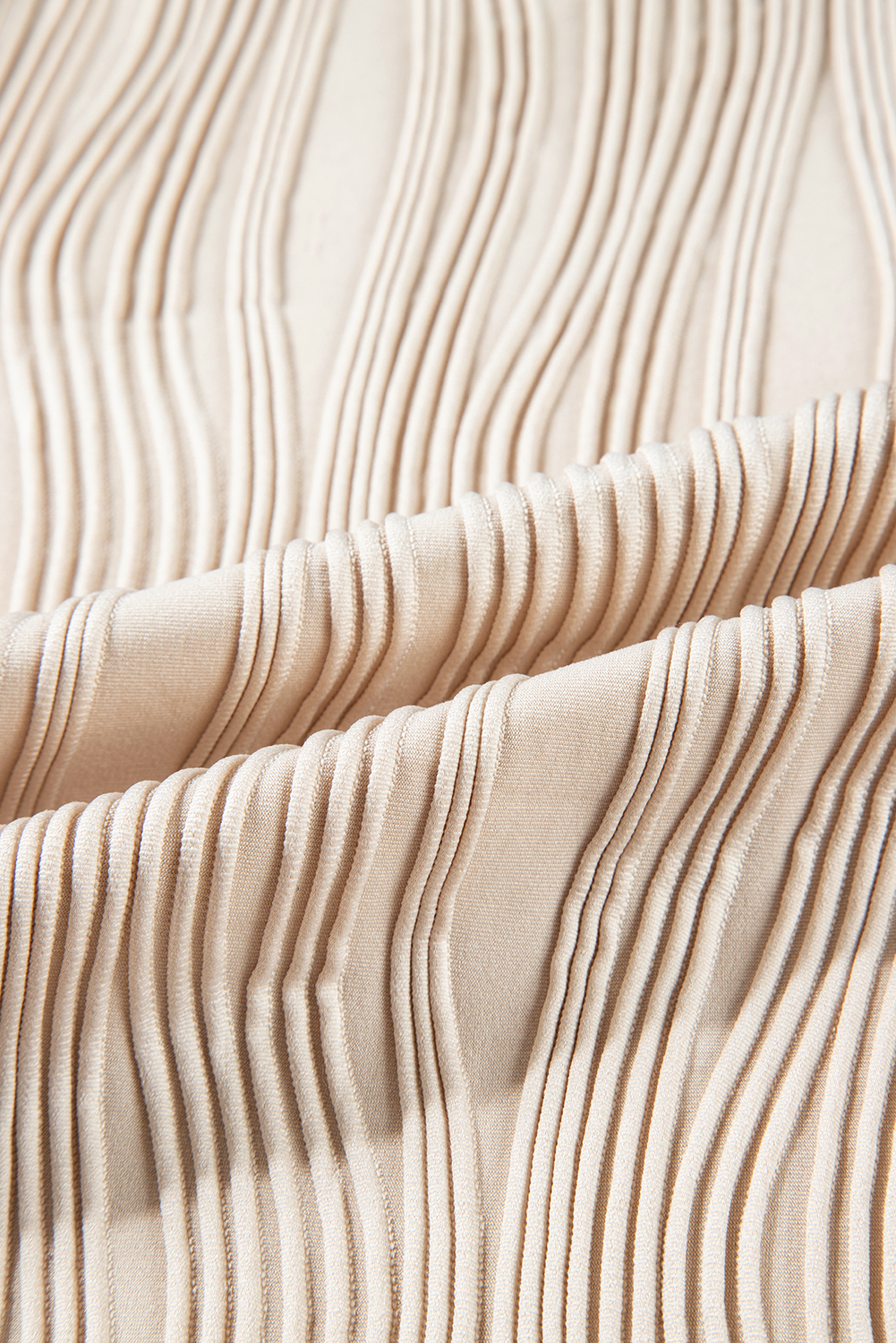 Classic Round Neck Textured Wavy Long Sleeve Top in Apricot - Detail View 12 Classic Round Neck Textured Wavy Long Sleeve Top in Apricot - Detail View 12