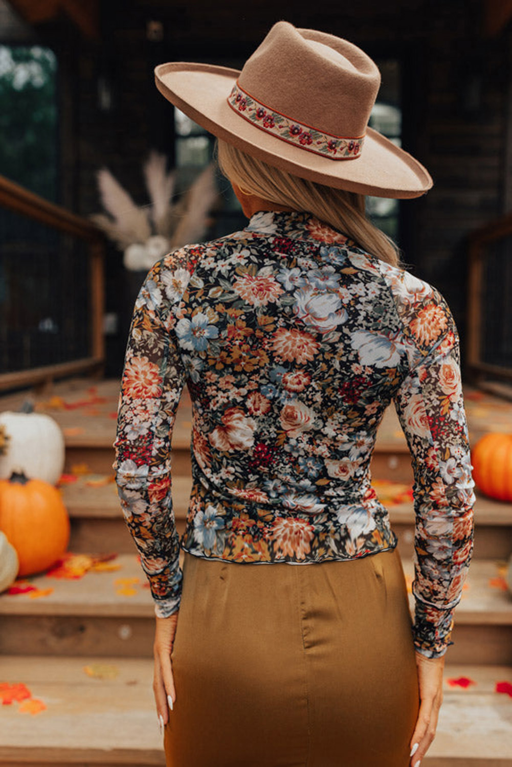 Elevate your style with this Women's Brown Floral High Neck Long Sleeve Sheath Blouse. The high neck design offers a polished and professional look, while the sheath cut accentuates the silhouette with feminine grace. The mesh fabric adds a subtle allure and a touch of modernity to the blouse. Pair it with tailored pants or skirts for a pretty ensemble. This blouse is perfect for daily wear, whether for a casual or formal occasion. The 95% polyester and 5% elastane blend ensures durability and comfort. The floral print in brown adds a touch of elegance and sophistication to your outfit. - Detail View 9 Elevate your style with this Women's Brown Floral High Neck Long Sleeve Sheath Blouse. The high neck design offers a polished and professional look, while the sheath cut accentuates the silhouette with feminine grace. The mesh fabric adds a subtle allure and a touch of modernity to the blouse. Pair it with tailored pants or skirts for a pretty ensemble. This blouse is perfect for daily wear, whether for a casual or formal occasion. The 95% polyester and 5% elastane blend ensures durability and comfort. The floral print in brown adds a touch of elegance and sophistication to your outfit. - Detail View 9